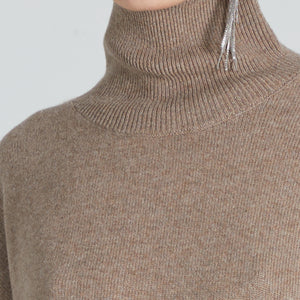 Closeup of brown cashmere turtleneck 